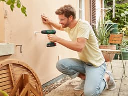 Productfoto van Bosch EasyImpact 18V-38 accuklopboor met accu en lader